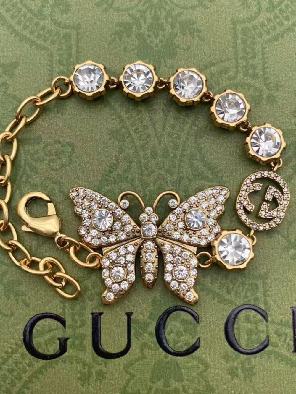 Gucci Gold-Tone Crystal Butterfly & GG Logo Tennis Bracelet